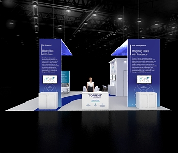 20x30 trade show booth with hanging sign, display walls, digital screens, and seating